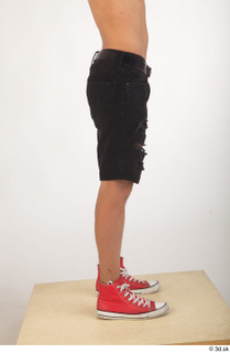 Colin black shorts clothing leg lower body red shoes 0007.jpg